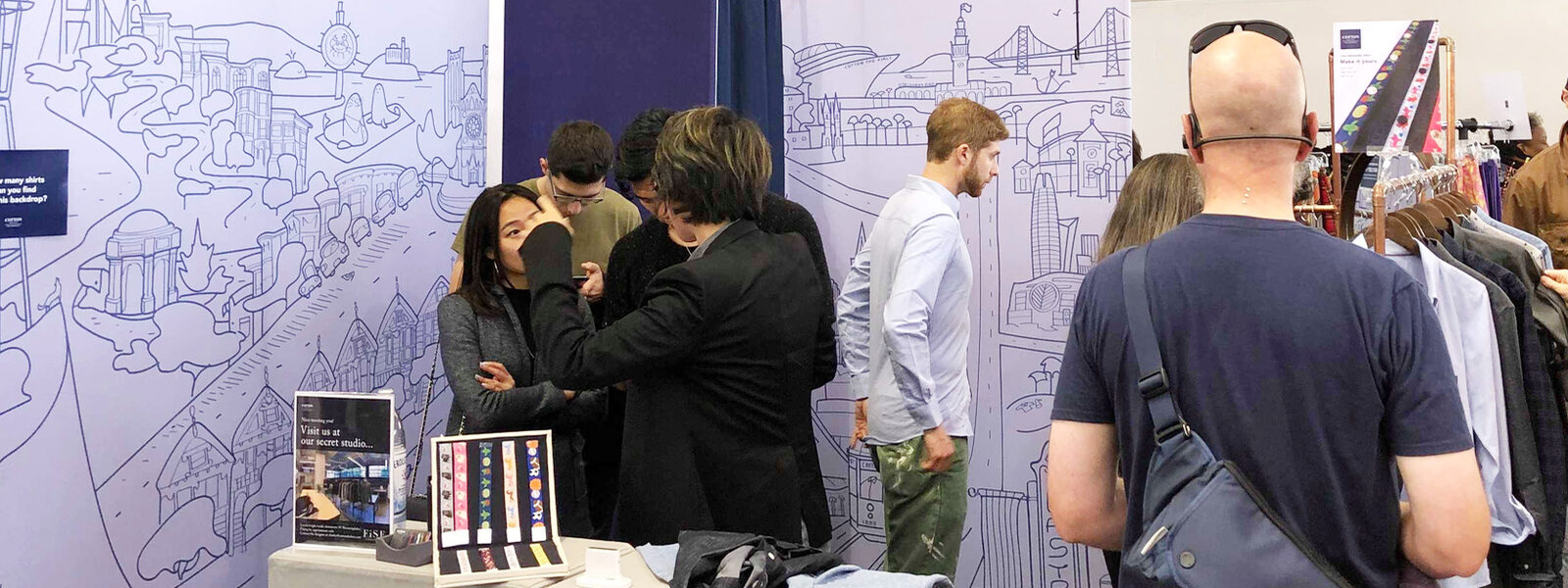 Cotton the First — Customers at pop-up booth, crowd view 1